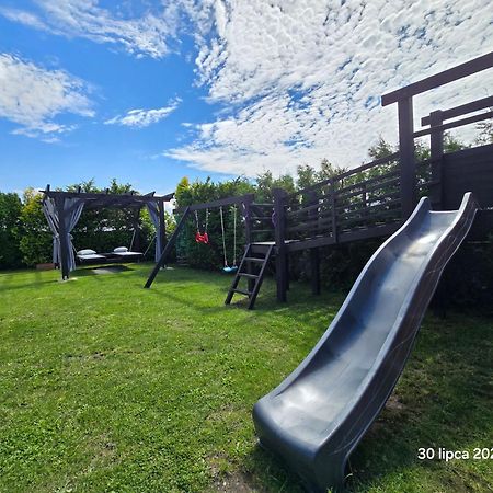 Domek Parterowy Apartamentowy Ostoja Rewal Exteriör bild