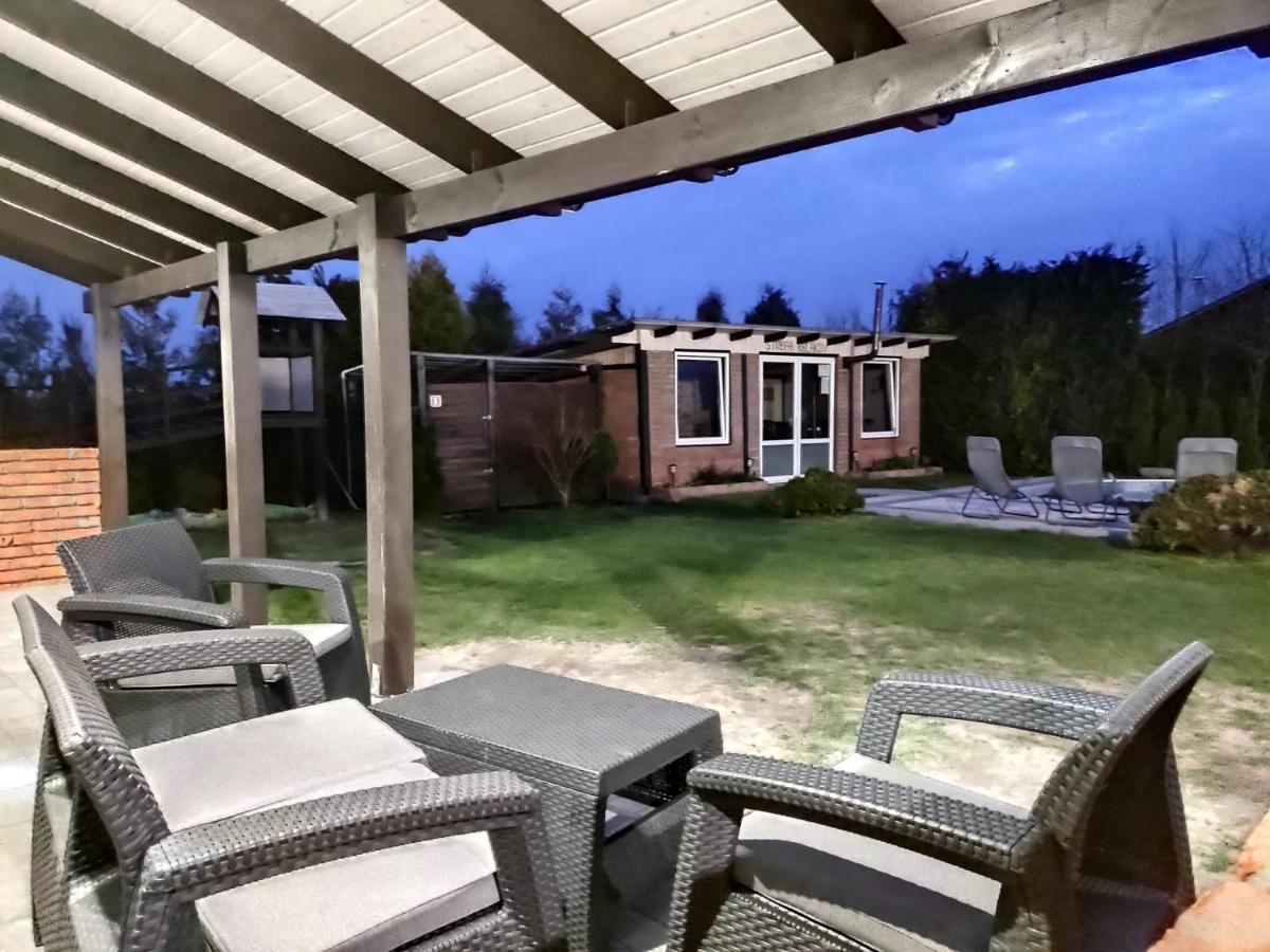 Domek Parterowy Apartamentowy Ostoja Rewal Exteriör bild