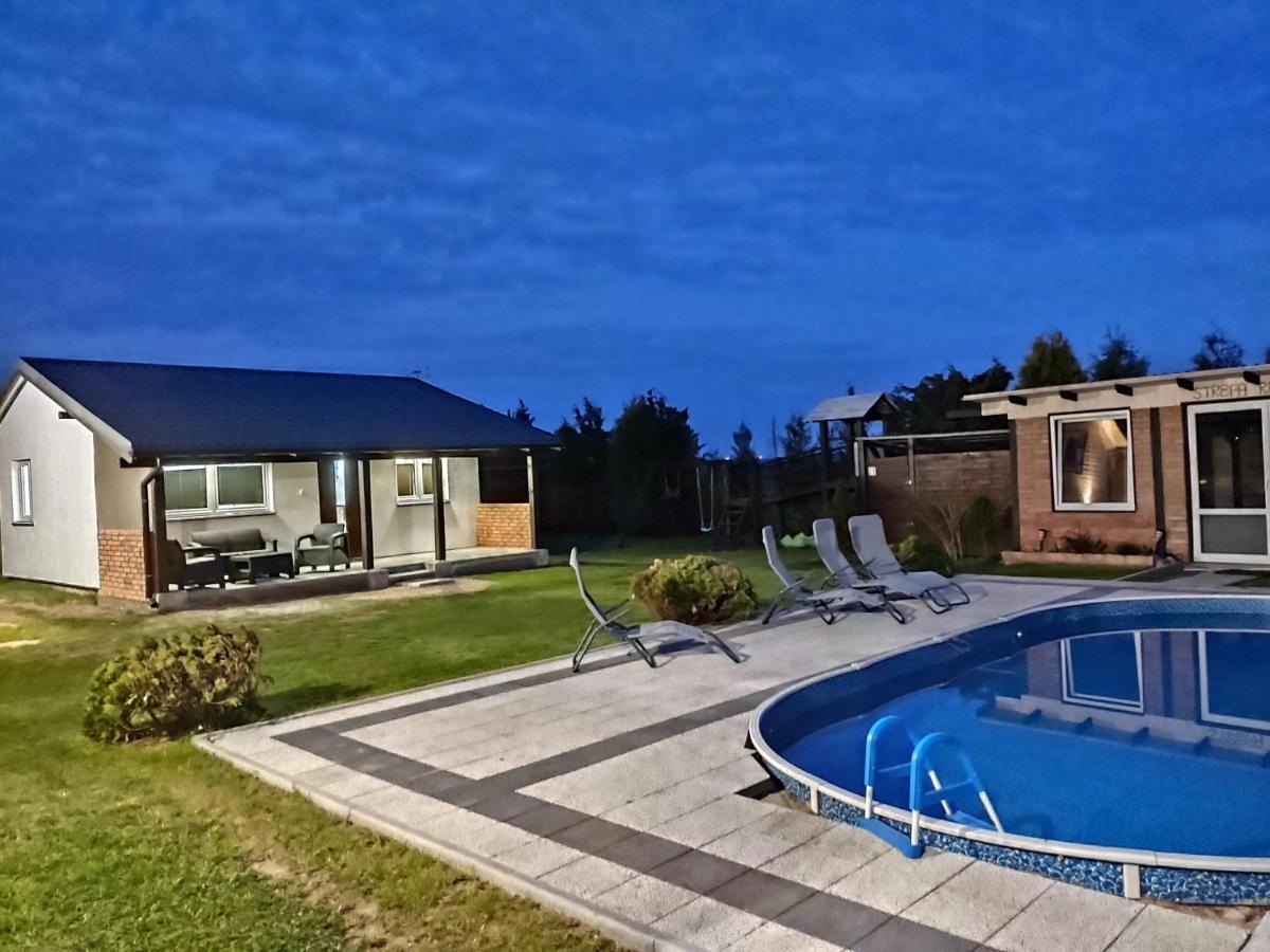 Domek Parterowy Apartamentowy Ostoja Rewal Exteriör bild